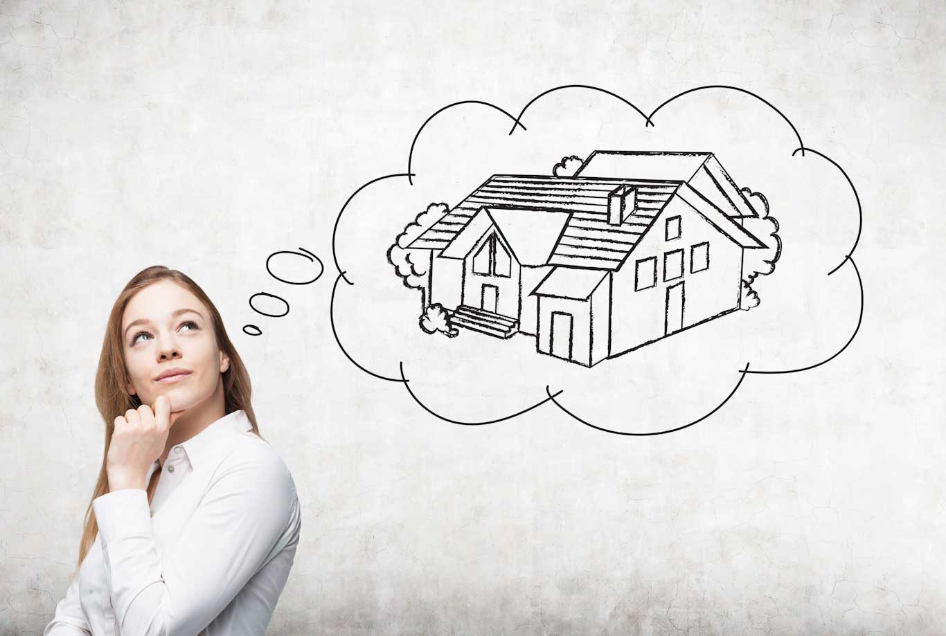 Una ragazza con lo sguardo felice verso l'alto immagina la sua nuova casa, una villetta unifamiliare, qui rappresentata con uno schizzo a matita in modo stilizzato all'interno di una nuvola